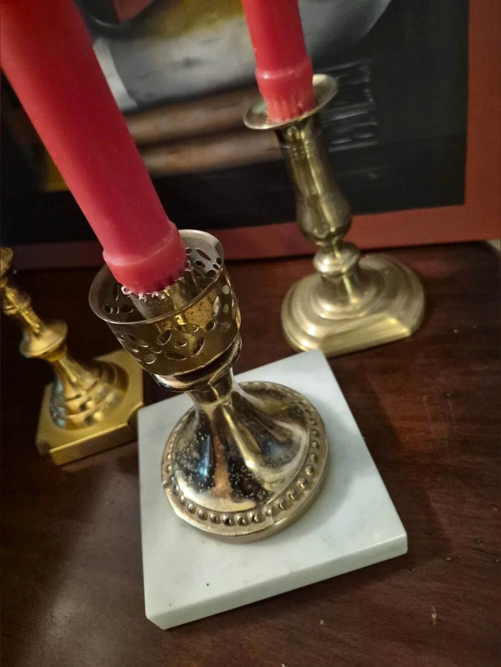 Lot of 3 Vintage  brass candlesticks feature classic designs with sturdy base